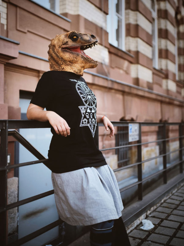 AbyssalCult Shirt worn by T-Rex masked person leaning on rail